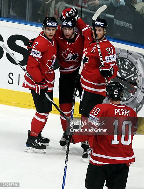 John Tavares of Canada celebrates his team's first goal with team mates Kris Russell , Steve Stamkos and Corey Perry during the IIHF World...