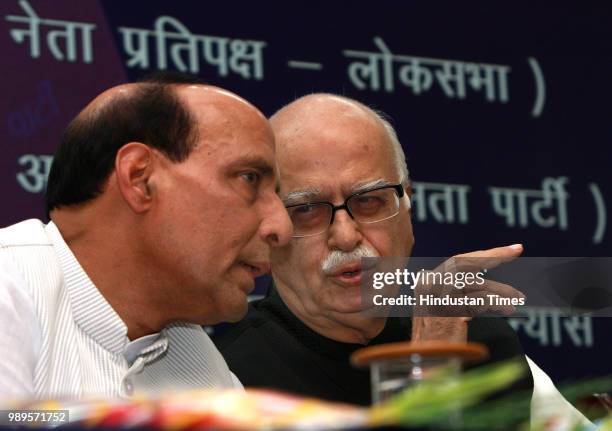 Leader L.K. Advani with Rajnath Singh at a book release ceremony on the occassion of Balidan Diwas of Dr. Shyama Prasad Mukherjee, on June 23, 2008...