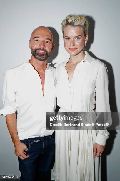 Stylist Bertrand Guyon and Alice Eve pose after the Schiaparelli Haute Couture Fall Winter 2018/2019 show as part of Paris Fashion Week on July 2,...