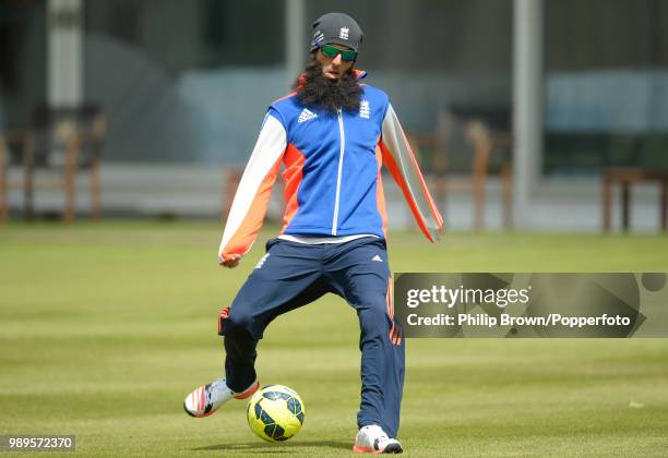 Moeen Ali of England warms up with a game of football before a training session before the 1st Test match between England and New Zealand at Lord's...