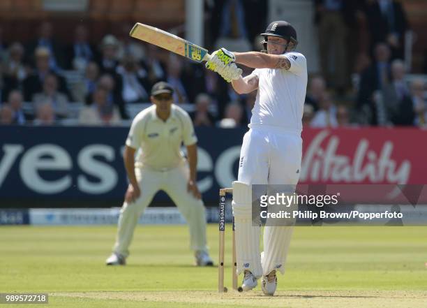 Ben Stokes of England hits a boundary during his innings of 92 runs in the 1st Test match between England and New Zealand at Lord's Cricket Ground,...