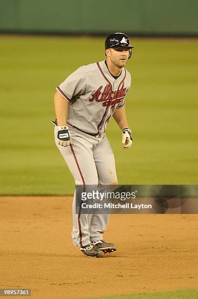 David Ross of the Atlanta Braves leads off second base during a baseball game against the Washington Nationals on May 6, 2010 at Nationals Park in...