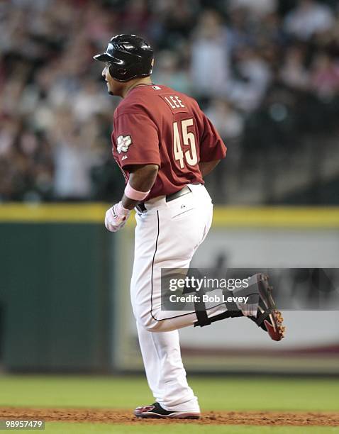 Carlos Lee of the Houston Astros runs against the San Diego Padres at Minute Maid Park on May 9, 2010 in Houston, Texas.