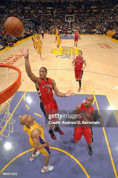 DeMar DeRozan of the Toronto Raptors puts a shot up against Derek Fisher of the Los Angeles Lakers at Staples Center on March 9, 2010 in Los Angeles,...