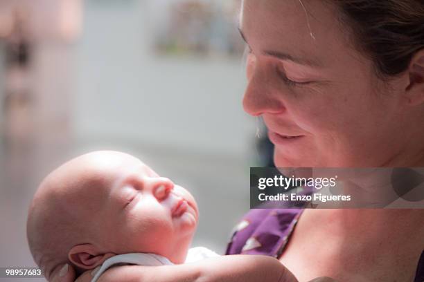 mother with  baby in her arms - mendoza province stock pictures, royalty-free photos & images