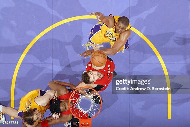 Andrea Bargnani of the Toronto Raptors leaps for the ball against Andrew Bynum of the Los Angeles Lakers at Staples Center on March 9, 2010 in Los...