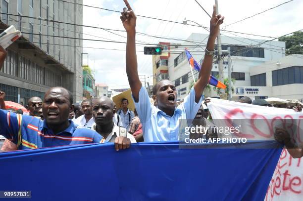 Haitians demonstrate on May 10, 2010 in Port-au-Prince against their President Rene Preval's decision to extend his presidentiel mandate for three...