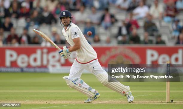 England captain Alastair Cook hits out during his innings of 162 in the 1st Test match between England and New Zealand at Lord's Cricket Ground,...