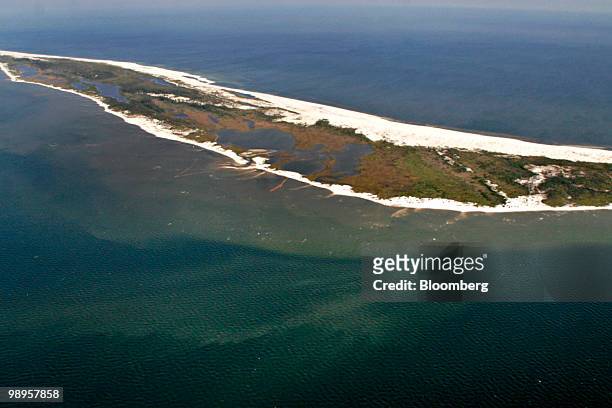 Oil surrounds the coast of the Chandeleur Islands in Louisiana, U.S., on Saturday, May 8, 2010. Oil has been gushing from the Macondo well at an...