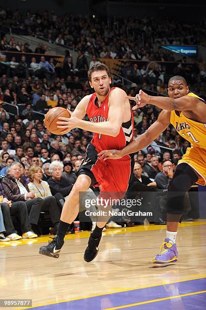 Andrea Bargnani of the Toronto Raptors drives the ball against Andrew Bynum of the Los Angeles Lakers at Staples Center on March 9, 2010 in Los...