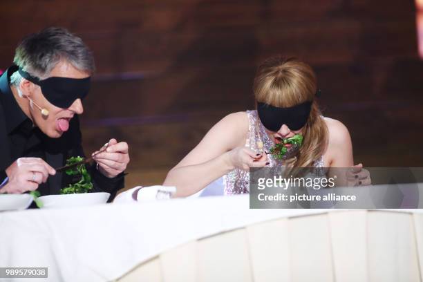 Presenter Joerg Pilawa and Swiss singer Francine Jordi eating blindfolded at the final rehersal for the Silvestershow in Graz, Austria, 30 December...