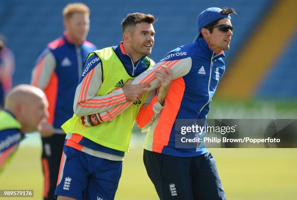 James Anderson and Alastair Cook of England tangle during a training session before the 2nd Test match between England and New Zealand at Headingley,...