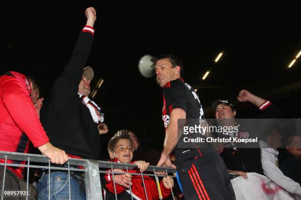 Bernd Schneider of Leverkusen celebrates with the fans after the Bernd Schneider farewell match between Bayer Leverkusen and Schnix All Stars at the...