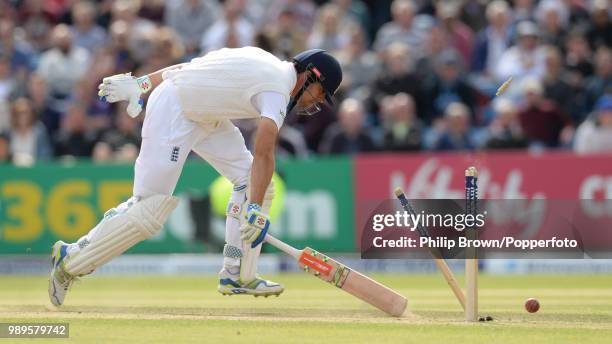 England captain Alastair Cook makes his ground as the stumps are thrown down during the 2nd Test match between England and New Zealand at Headingley,...