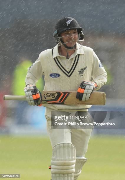 Watling of New Zealand leaves the field during a rain delay in the 2nd Test match between England and New Zealand at Headingley, Leeds, 31st May...