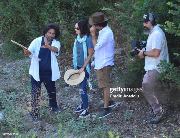 American model and actress Megan Fox receives information from Chair of Troy Antique City Excavation Committee and Canakkale Onsekiz Mart University...