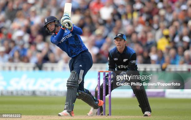 Jos Buttler of England hits a six during his innings of 129 runs in the 1st Royal London One Day International between England and New Zealand at...