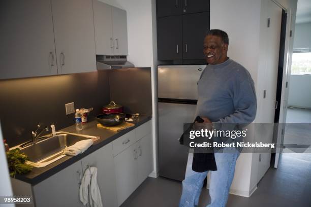 Members of the chronically homeless and low income community were able to take up residency in the recently completed 95-unit Carver Apartments April...