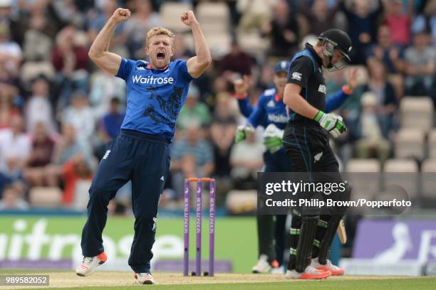 David Willey of England celebrates after dismissing New Zealand opener Martin Guptill for 2 runs during the 3rd Royal London One Day International...