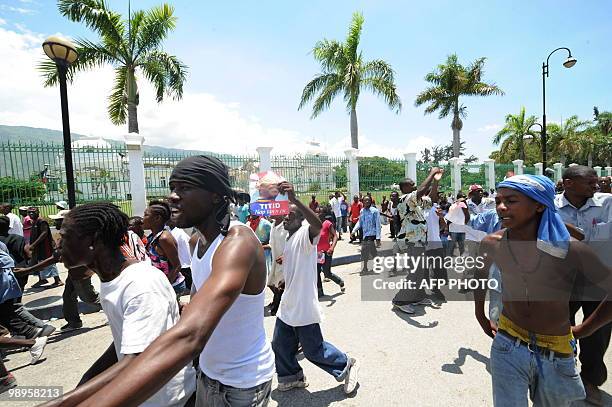 Haitians demonstrate on May 10, 2010 in Port-au-Prince against their President Rene Preval's decision to extend his presidentiel mandate for three...