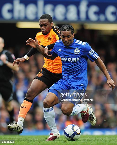 Florent Malouda of Chelsea holds off Charles N'Zogbia of Wigan Athletic during the Barclays Premier League match between Chelsea and Wigan Athletic...
