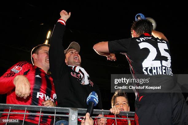 Bernd Schneider of Leverkusen celebrates with the fans after the Bernd Schneider farewell match between Bayer Leverkusen and Schnix All Stars at the...