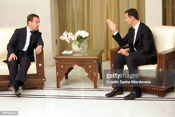 Syrian President Bashar al-Assad receives Russian President Dmitry Medvedev on May 2010 in Damascus, Syria. Medvedev is on a two-day state visit and...