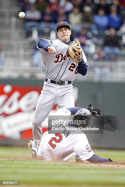 Scott Sizemore of the Detroit Tigers forces out Denard Span of the Minnesota Twins on May 5, 2010 at Target Field in Minneapolis, Minnesota. The...