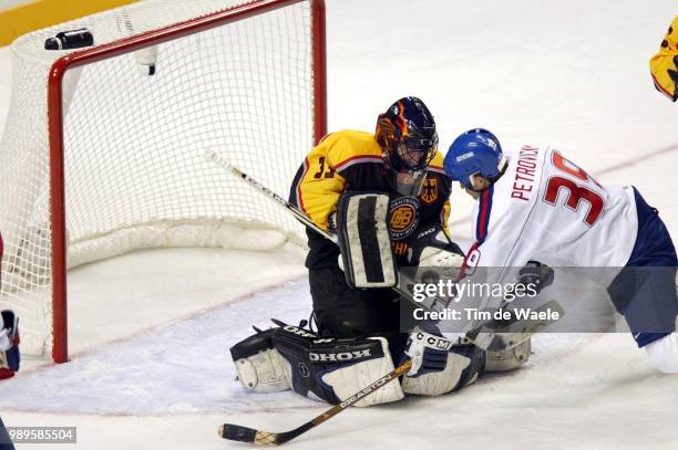 Winter Olympic Games : Salt Lake City, Hockey Sur Glace, Ice, Ijshockey /German Goalie Marc Seliger Stops A Shot On Goal By Robert Petrovicky Of...