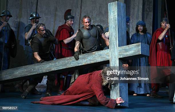 Andreas Richter as Jesus Christ and ensemble members perform on stage during the Oberammergau passionplay 2010 final dress rehearsal on May 10, 2010...