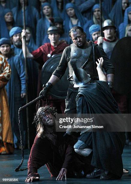 Andreas Richter as Jesus Christ and ensemble members perform on stage during the Oberammergau passionplay 2010 final dress rehearsal on May 10, 2010...