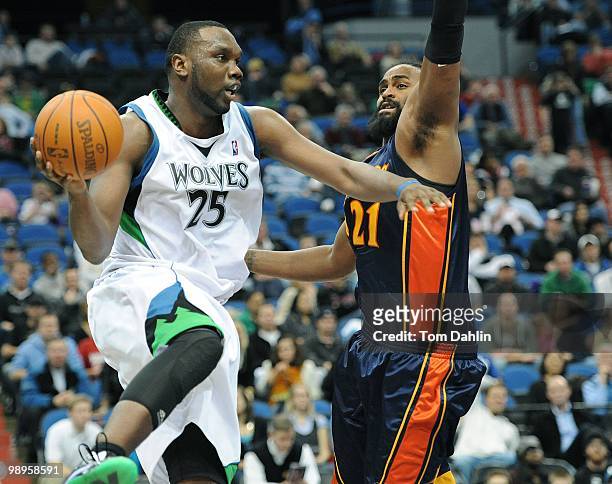 Al Jefferson of the Minnesota Timberwolves passes against Ronny Turiaf of the Golden State Warriors during the game on January 6, 2010 at the Target...