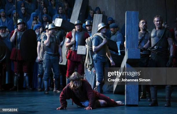 Andreas Richter as Jesus Christ and ensemble members perform on stage during the Oberammergau passionplay 2010 final dress rehearsal on May 10, 2010...