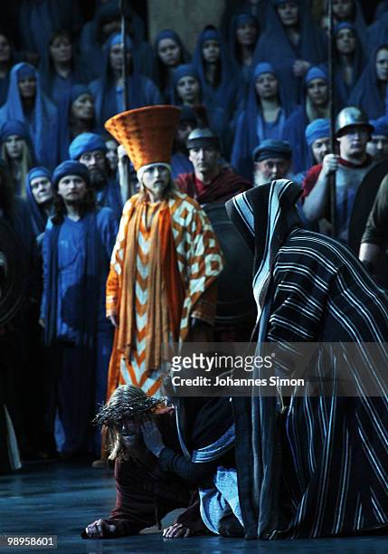 Andreas Richter as Jesus Christ and ensemble members perform on stage during the Oberammergau passionplay 2010 final dress rehearsal on May 10, 2010...