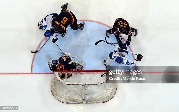 Robert Zepp, goalkeeper of Germany saves the shot of Leo Komarov of Finland during the IIHF World Championship group A match between Germany and...