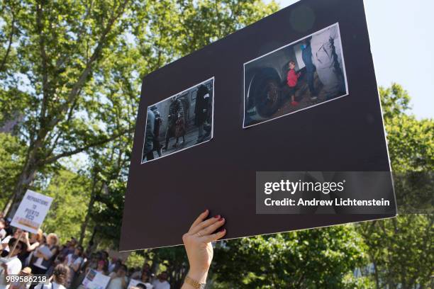 Demonstrators gather in Brooklyn as part of a national "Families Belong Together" rallies across the country to protest the Trump administration's...