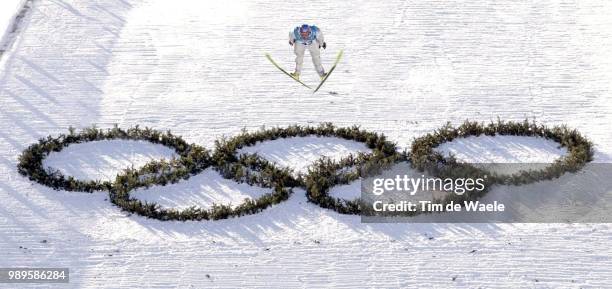 Winter Olympic Games : Salt Lake City, 2/9/02 Park City, Utah, United States --- With The Olympic Rings As A Backdrop, Todd Lodwick Of The Us Soars...