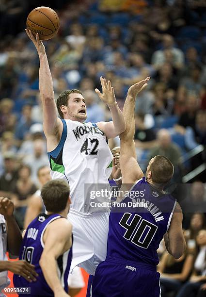 Kevin Love of the Minnesota Timberwolves goes up for a shot against Jon Brockman of the Sacramento Kings during the game on March 31, 2010 at the...