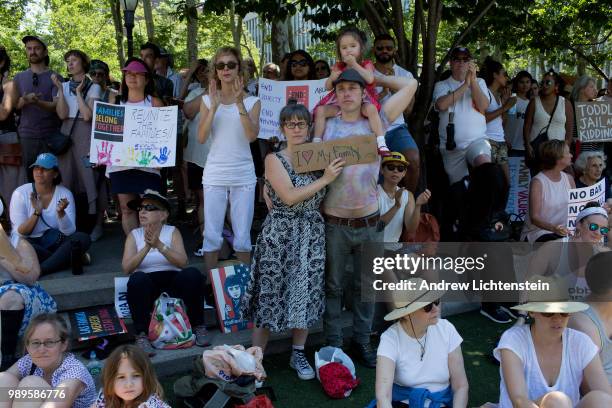 Demonstrators gather in Brooklyn as part of a national "Families Belong Together" rallies across the country to protest the Trump administration's...