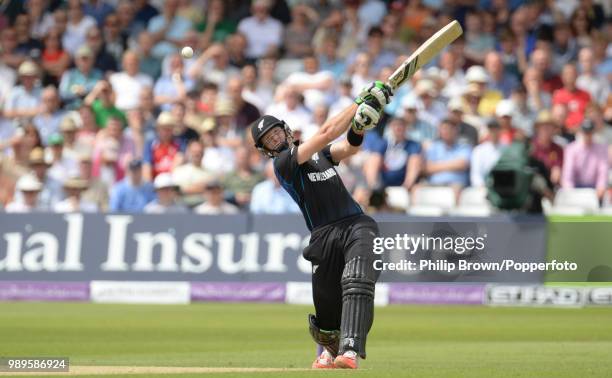 New Zealand opener Martin Guptill hits a boundary during his innings of 53 runs in the 4th Royal London One Day International between England and New...