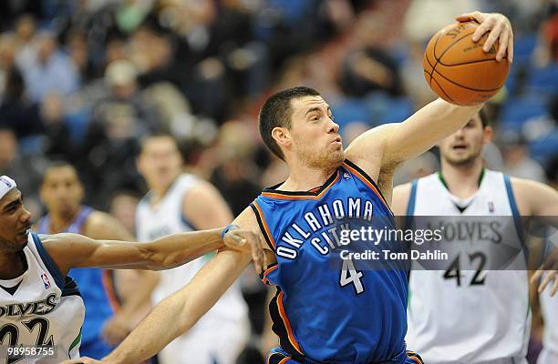 Nick Collison of the Oklahoma City Thunder rebounds against the Minnesota Timberwolves during the game on February 21, 2010 at the Target Center in...