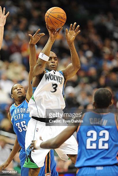 Damien Wilkins of the Minnesota Timberwolves passes against Jeff Green of the Oklahoma City Thunder during the game on February 21, 2010 at the...