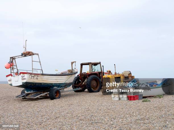 Fishing boats on the beach at Cley next the Sea on the north Norfolk coast, United Kingdom on 8th June 2018