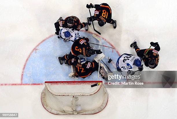 Robert Zepp, goalkeeper of Germany saves the shot of Jussi Jokinnen of Finland during the IIHF World Championship group A match between Germany and...