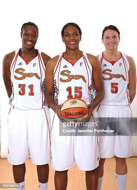 Tina Charles, Asjha Jones, Kelsey Griffin of the Connecticut Sun poses for a group photo during the 2010 WNBA Media Day on April 26, 2010 at Mohegan...