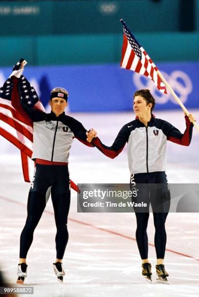 Winter Olympic Games : Salt Lake City, 2/12/02, Kearns, Utah, United States --- Us Speed Skaters Casey Fitzrandolph And Kip Carpenter Wave American...