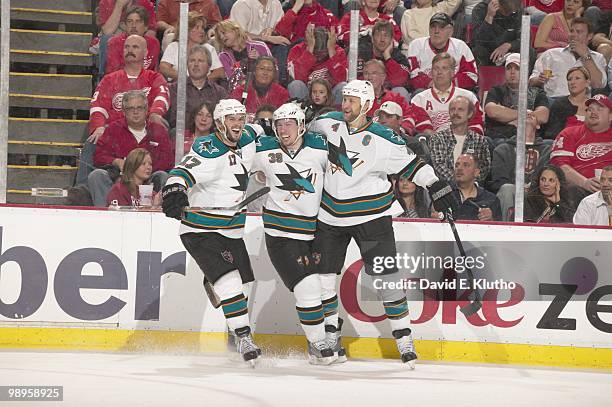 San Jose Sharks Logan Couture victorious after scoring goal with Torrey Mitchell and Rob Blake vs Detroit Red Wings. Game 3. Detroit, MI 5/4/2010...