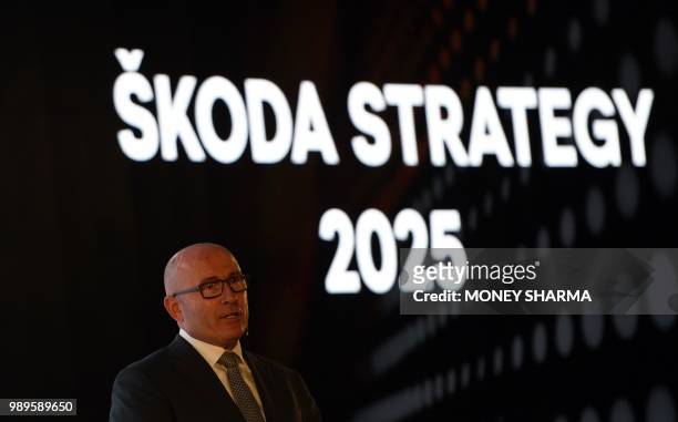 Bernhard Maier, Skoda Auto Chief Executive Officer, looks on as he speaks during a press conference in New Delhi on July 2, 2018.