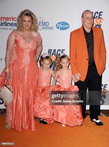 Nancy Davis, daughters Mariella Davis, Isabella Davis and husband Ken Rickel arrive to the 17th Annual Race To Erase MS held at Hyatt Regency Century...