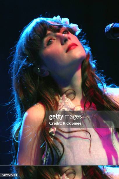 Zoey Deschanel of She and Him performs on stage at Shepherds Bush Empire on May 10, 2010 in London, England.